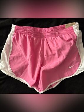 Nike Dri-FIT. Pink Girls Athletic Shorts with White Trim